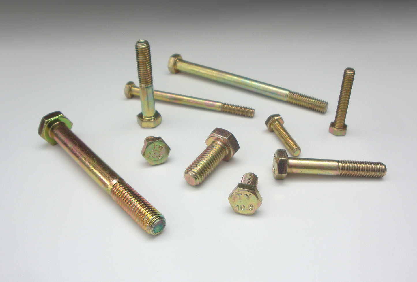 Sechskantschrauben, gelb verzinkt, 10.9 hochfest (DIN 931 / DIN 933)