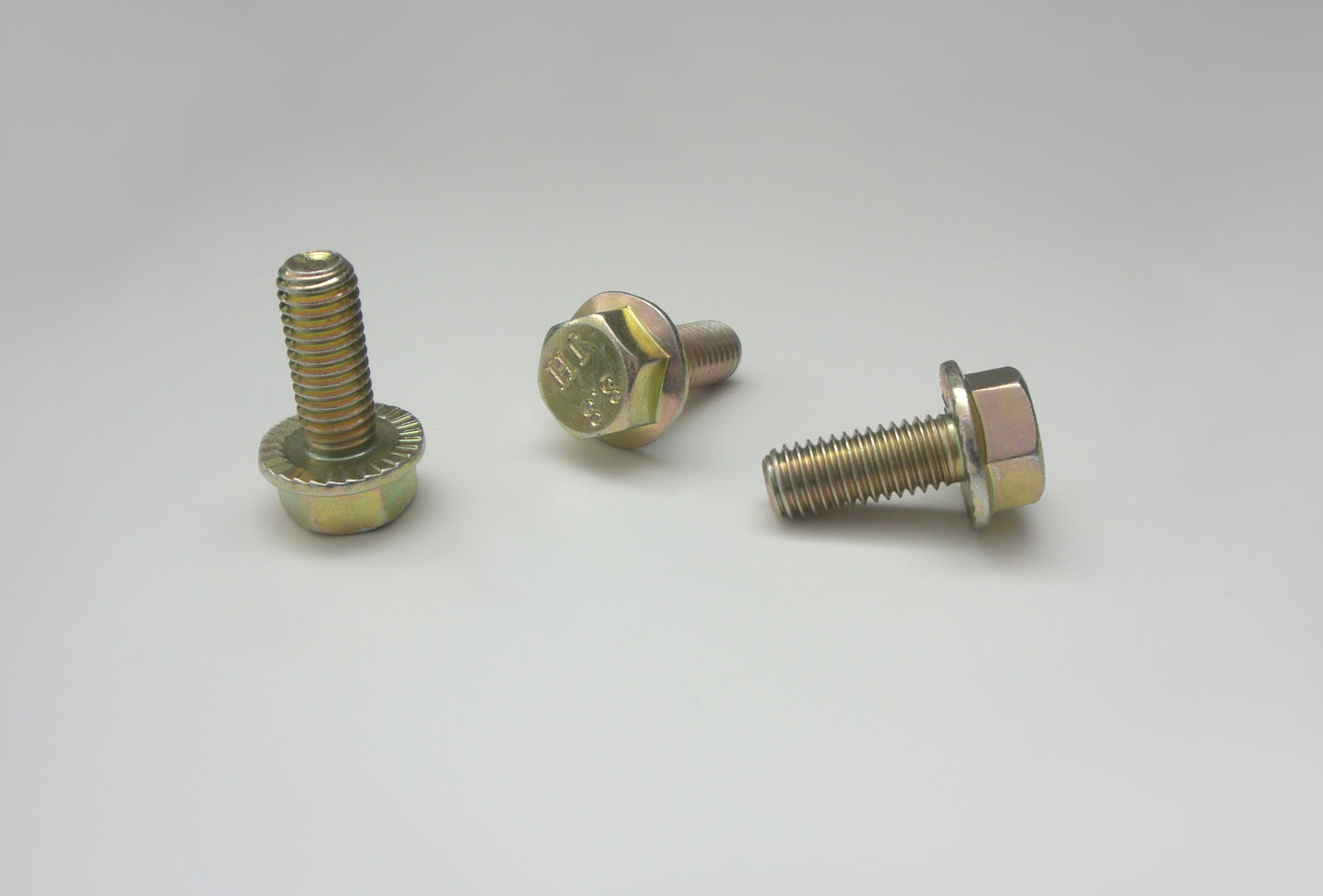 Sicherungsschrauben mit Flansch (Rippschrauben) , gelb verzinkt (DIN 6921-Ripp)